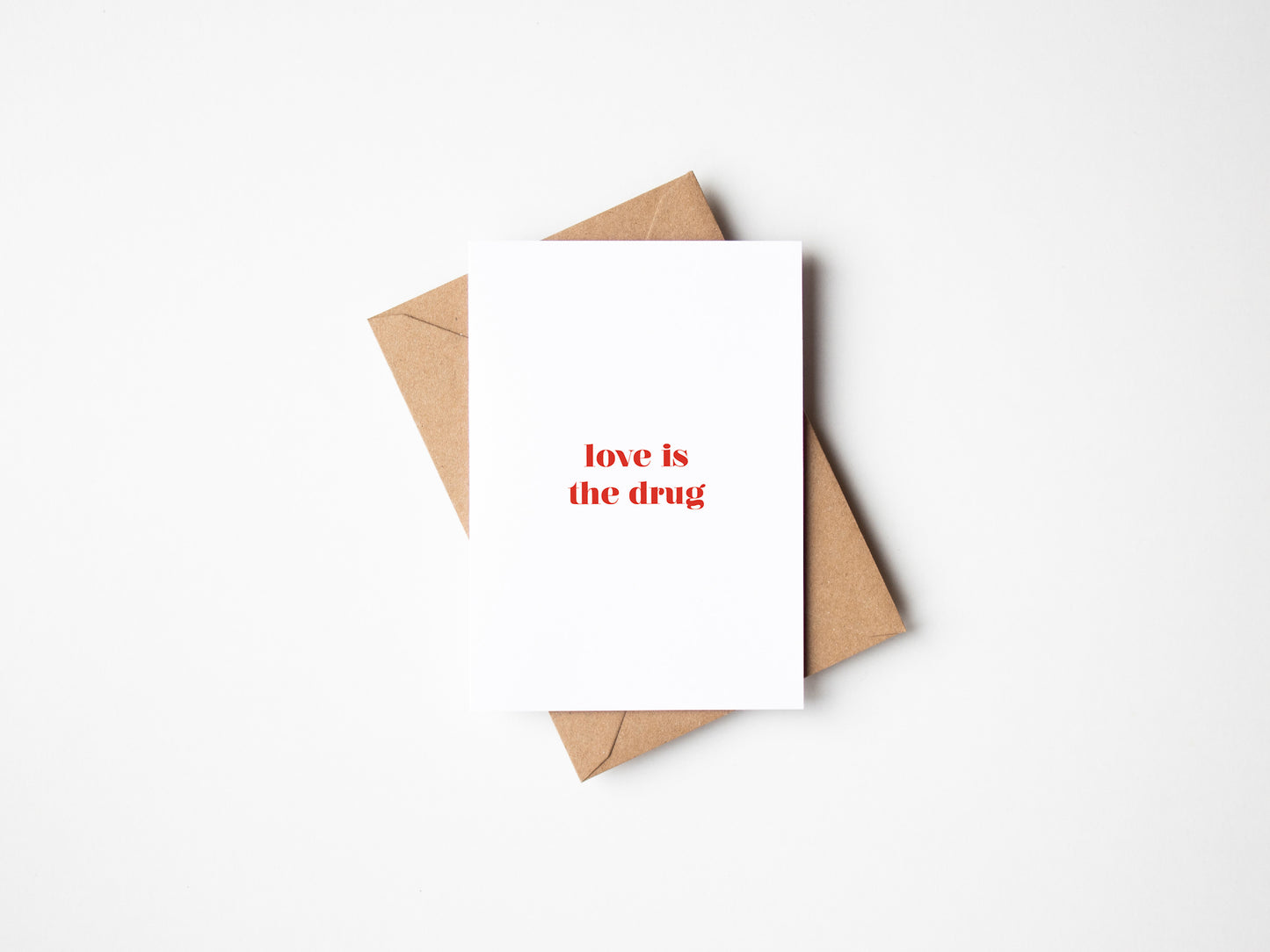 Love Is The Drug Greetings Card