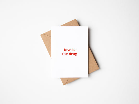 Love Is The Drug Greetings Card