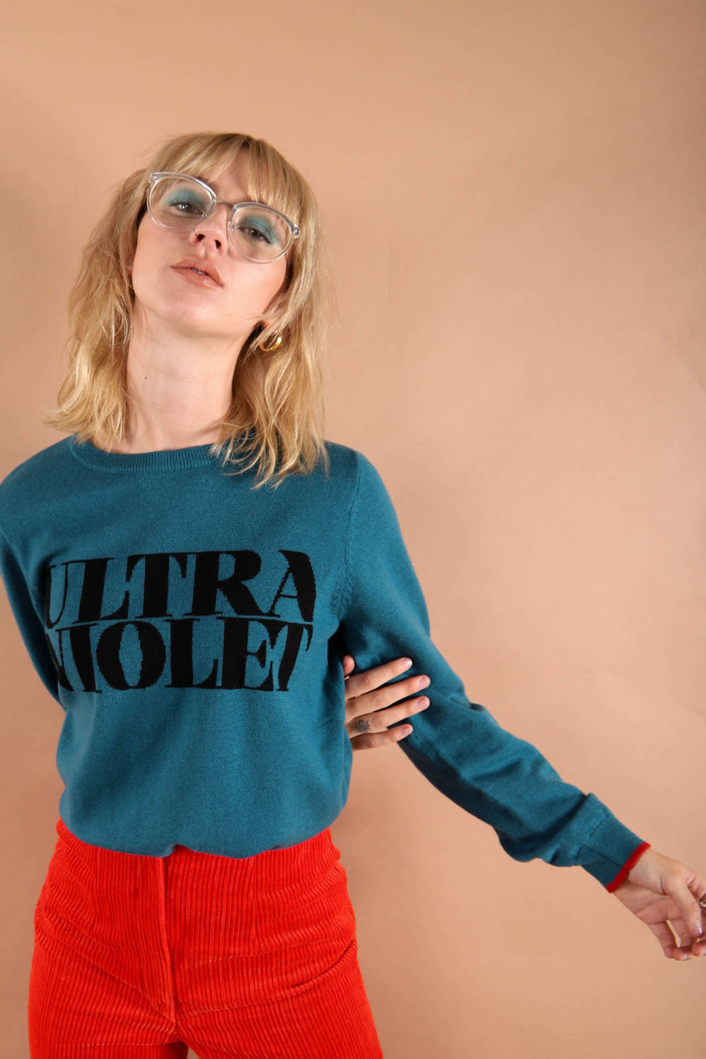 100% merino wool fine knit slogan jumper. Intarsia Ultra Violet slogan inspired by Andy Warhols superstars. Our retro colours pop and the super soft luxury knitwear supports slow sustainable fashion and independent brands.