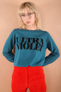 100% merino wool fine knit slogan jumper. Intarsia Ultra Violet slogan inspired by Andy Warhols superstars. Our retro colours pop and the super soft luxury knitwear supports slow sustainable fashion and independent brands.