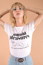 1960s muse Nico inspired illustrated graphic slogan t-shirt. Untold pleasures celebrates female empowerment and 60s style icons who made a statement. Made from organic cotton. Support Sustainable fashion